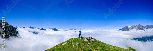 Above the clouds in the mountains of Oisans, Ecrins National Park, French Alps. photo
