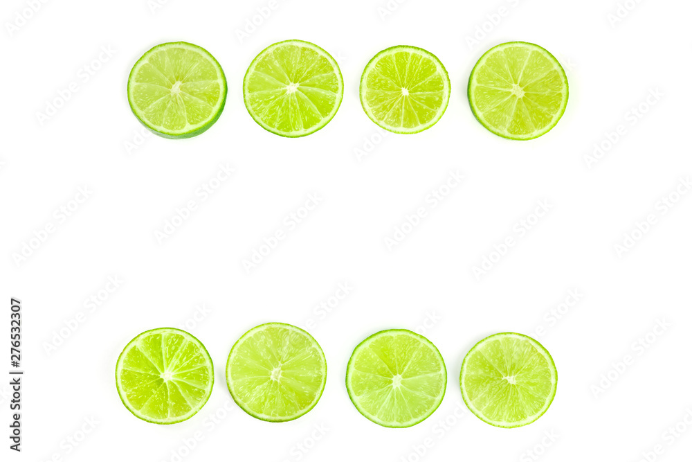 Vibrant lime slices, shot from the top on a white background, forming a frame with a place for text