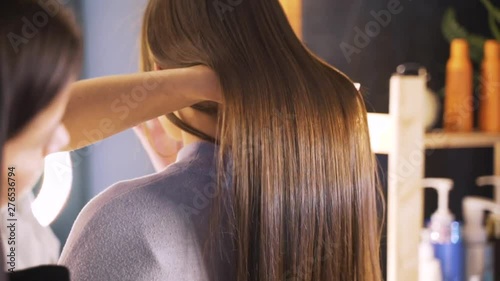 Wallpaper Mural Long dark hair of a young girl. Brilliant and silky hair after keratin straightening. The effect of keratin, botox, straight hair. The concept of beauty salons, beauty. Torontodigital.ca