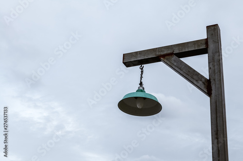 classic lamp post against sky
