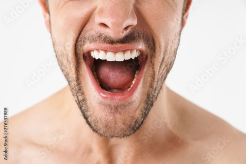 Cropped photo closeup of excited naked man screaming at camera with emotional face