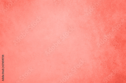 Abstract cement concrete background. Grunge texture, wallpaper. Trendy coral color of year 2019. Top view, copy space. Banner photo