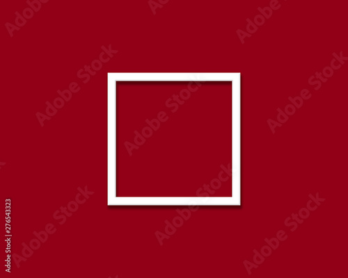 white picture frame on the wine red wall