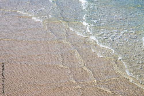 Fototapeta Naklejka Na Ścianę i Meble -  soft wave of the sea on the sandy beach.