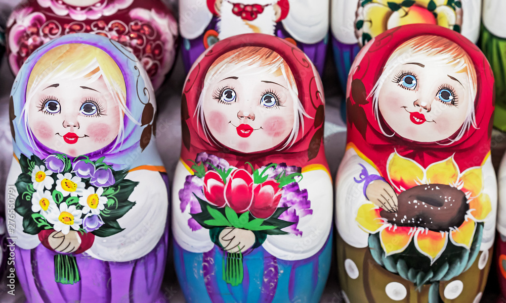 Matryoshka is a national Russian souvenir. Russian wooden doll matryoshka on the counter of the gift shop. Nested doll.