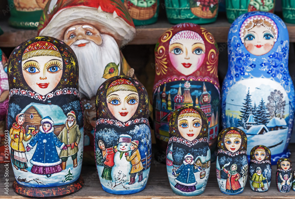 Matryoshka is a national Russian souvenir. Russian wooden doll matryoshka on the counter of the gift shop. Nested doll.