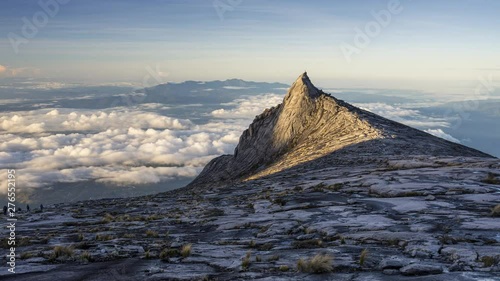 Timelapse of South peak of Kinabalu mountain massif in Sabah, Borneo island, Malaysia photo