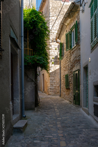 narrow street in old town © coffeinlix 