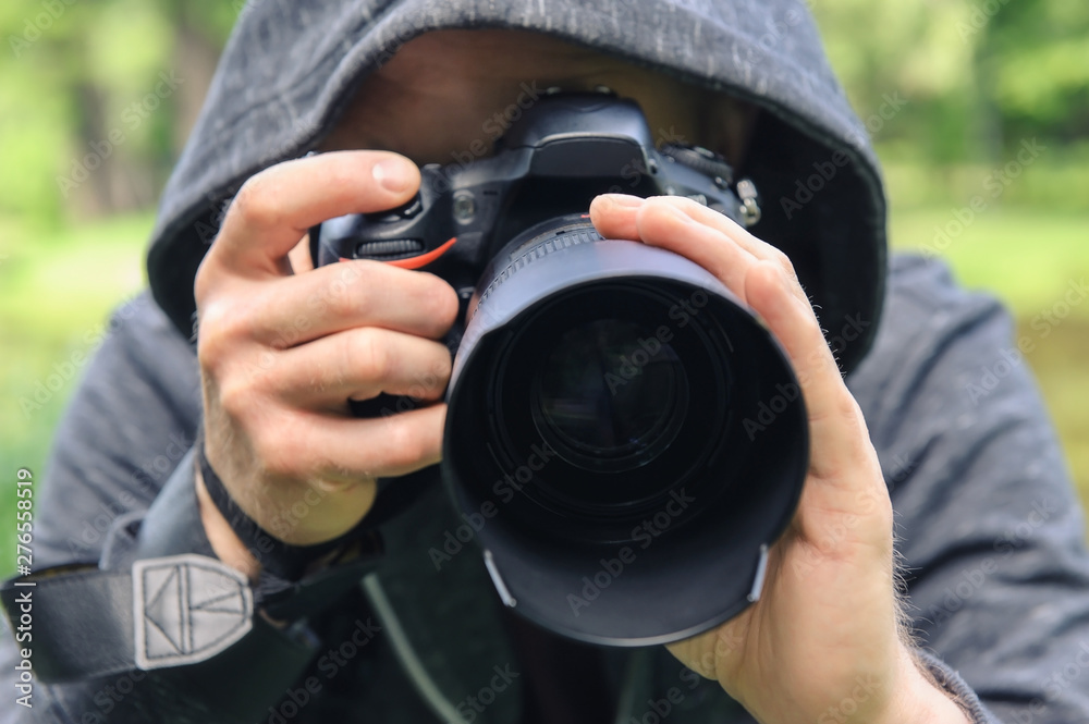 The photographer hidden with the camera.