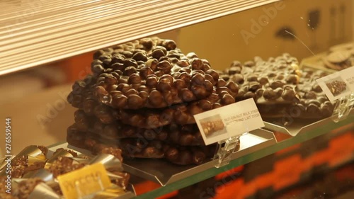4 in 1 Traditional Chocolate and confectionery shop with big choice of chocolates and sweets in Brussels downtown, Belgium
