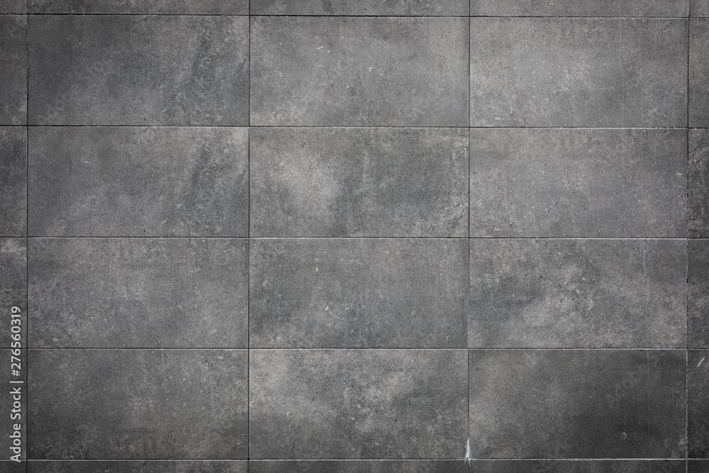 Fototapeta premium Grey stone wall outside texture background