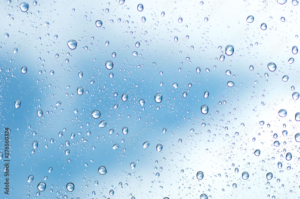 Water drops of rain on blue glass background - obrazy, fototapety, plakaty 