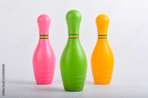 Colorful plastic skittles of toy bowling 