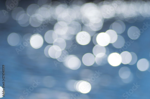 Blurred Lights on blue water bokeh background