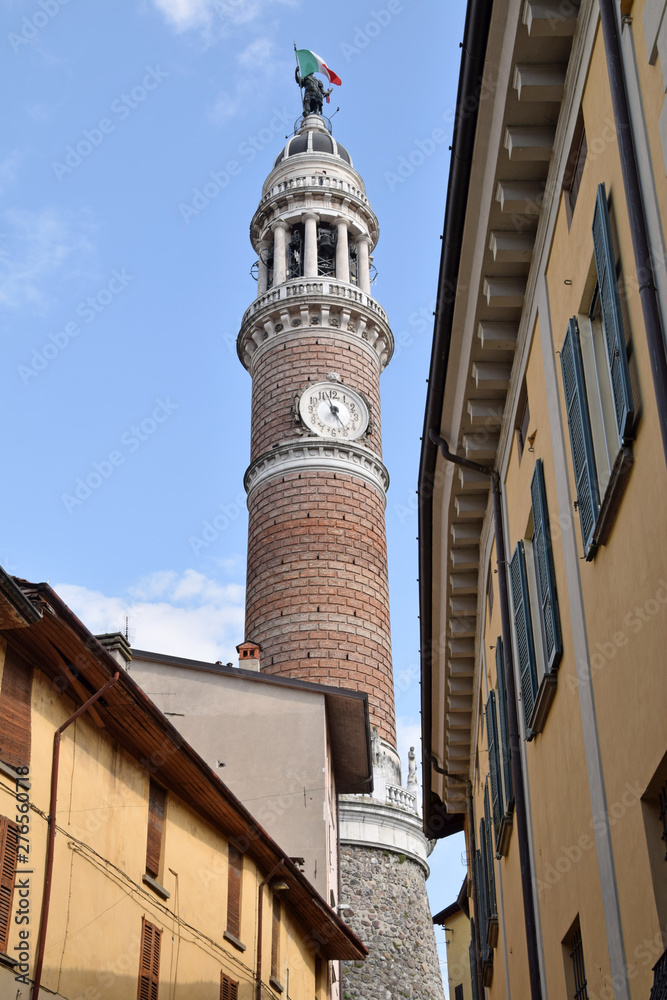 Fototapeta premium And among the alleys here is the highest circular bell tower in Italy - Palazzolo on the Oglio river - Italy