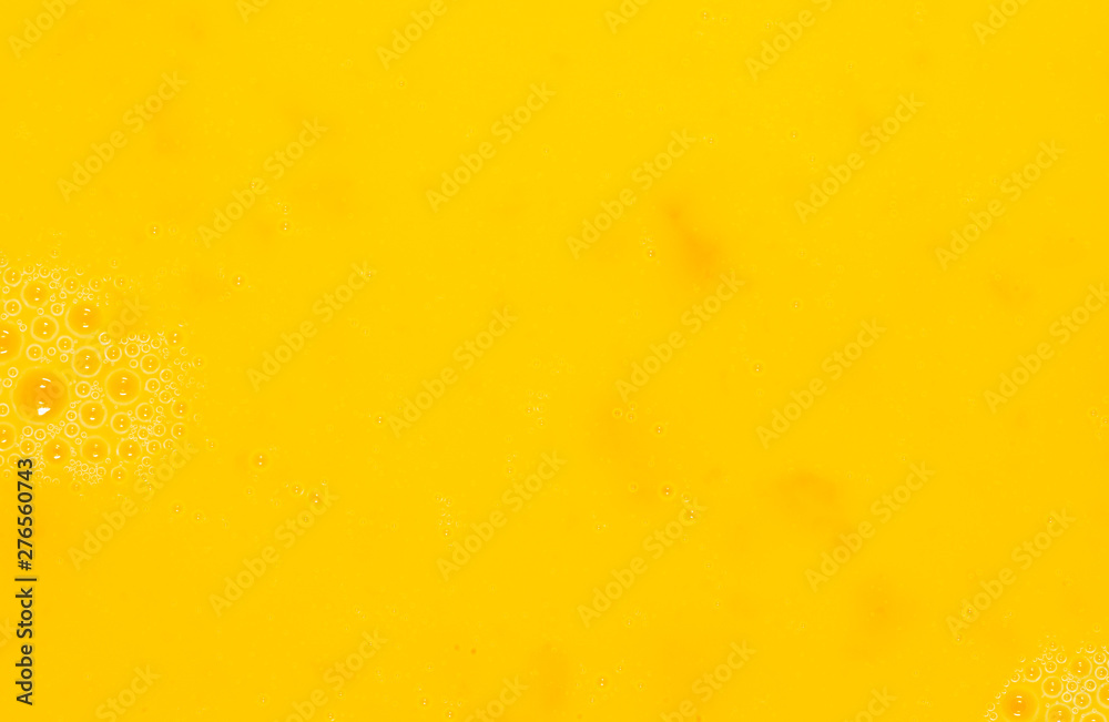 Whipped yolk with eggs as an abstract background