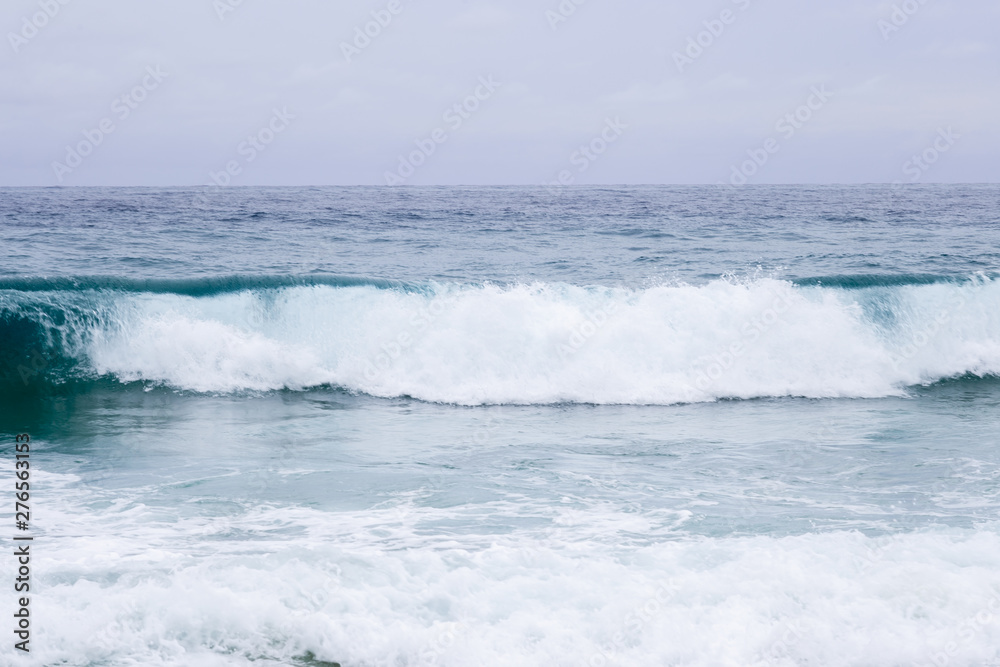 Blue wave water in the ocean