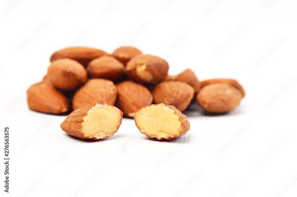 Group of almonds on white background