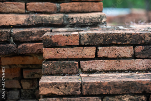 Details and closeup of red old and vintage style bricks from a historic architecture in Ayutthaya Historical Park  Ayutthaya Province  Thailand  Asia.