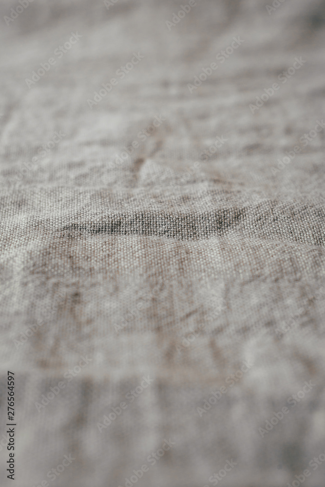 Close up view of natural linen fabric texture and background.. Close up view of natural linen fabric texture and background..