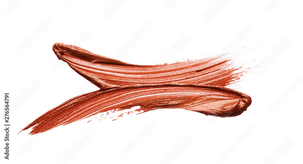 Smears and texture of bronze lip gloss isolated on white background