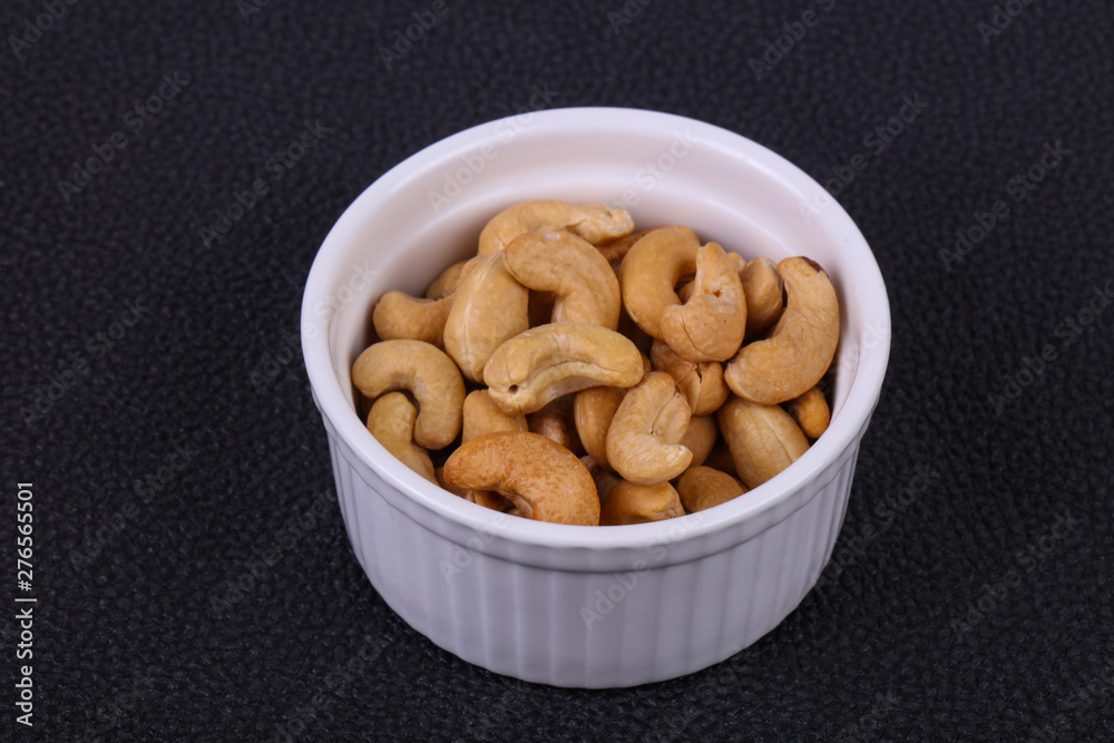 Cashew nuts heap in the bowl Cashew nuts heap in the bowl