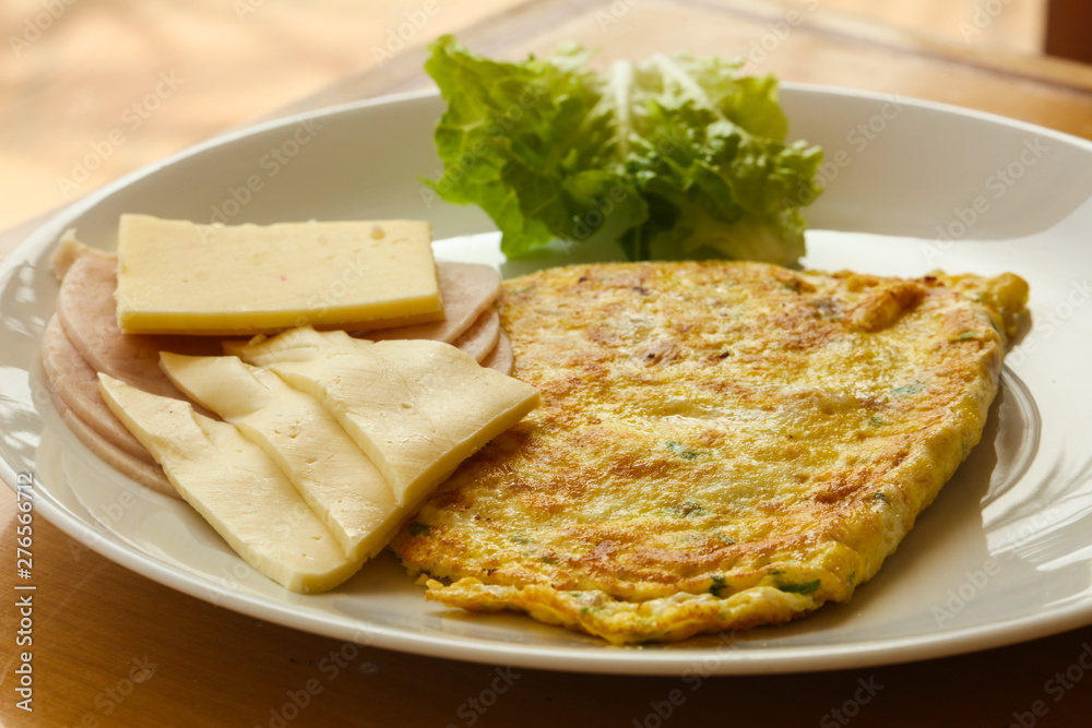 Omelet with cheese and salad Omelet with cheese and salad