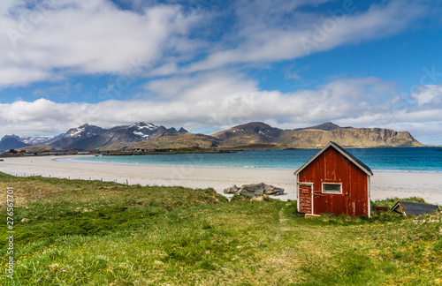 Ramberg Beach, Lofoten Islands, Norway with golden sand and azure sea photo