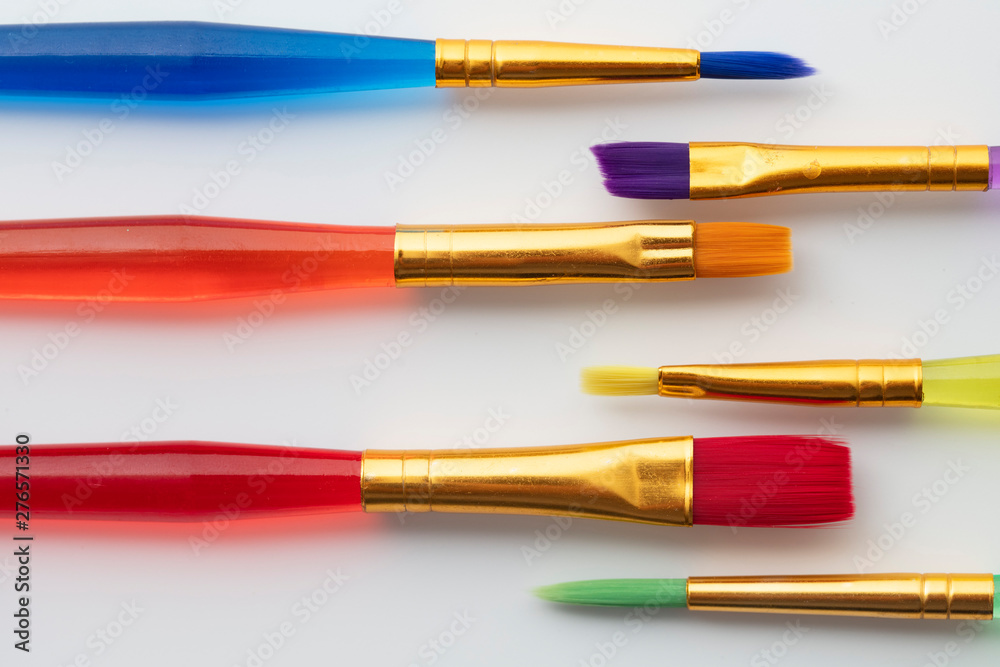 Colourful creative paintbrush art supply background Colourful creative paintbrush art supply background