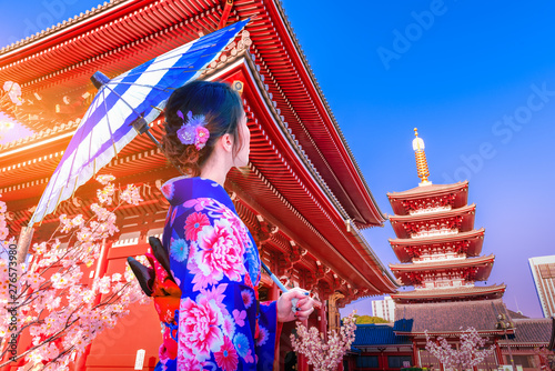 Japanese lady in Kimono dress looking Sensoji Temple, Asakusa city, Tokyo, Japan. © chanchai