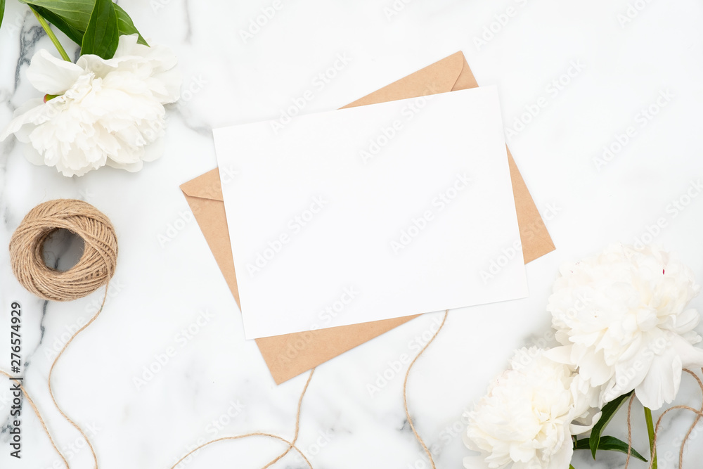 Top view blank wedding invitation card on marble background with white  peony flowers and twine. Minimal flatlay style composition, concept of  wedding and marriage. Beauty or fashion blog banner mockup Stock Photo |