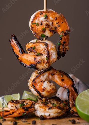 Skewer shrimps burnt grilled with spice seasoning.