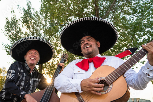 Mexican musicians mariachi band street concert