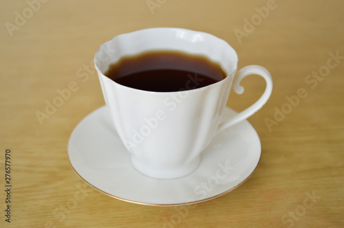 cup of tea on wooden table