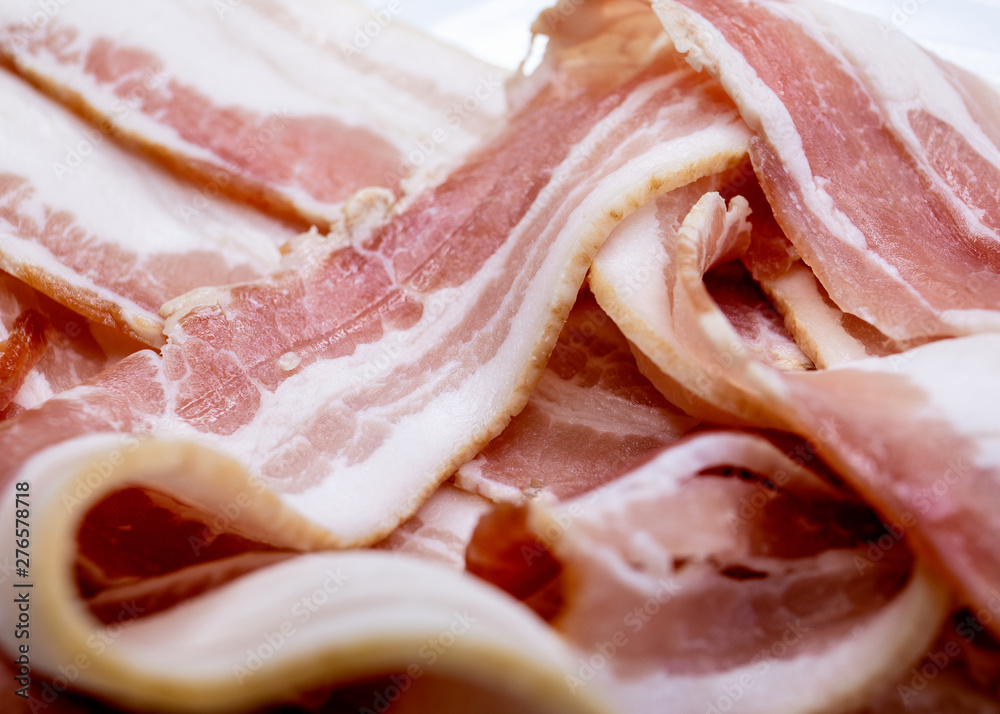 Slices of bacon, salt-cured pork Slices of bacon, salt-cured pork