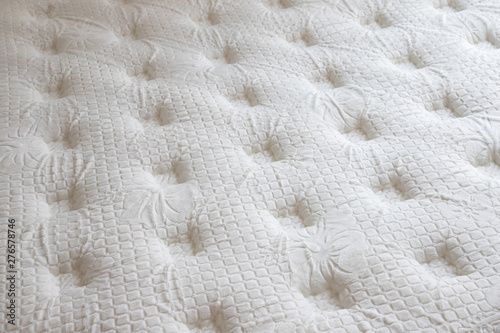 soft mattress background and texture. concept : allergy in bed room, dust mites on bed, sheep wool mattress.