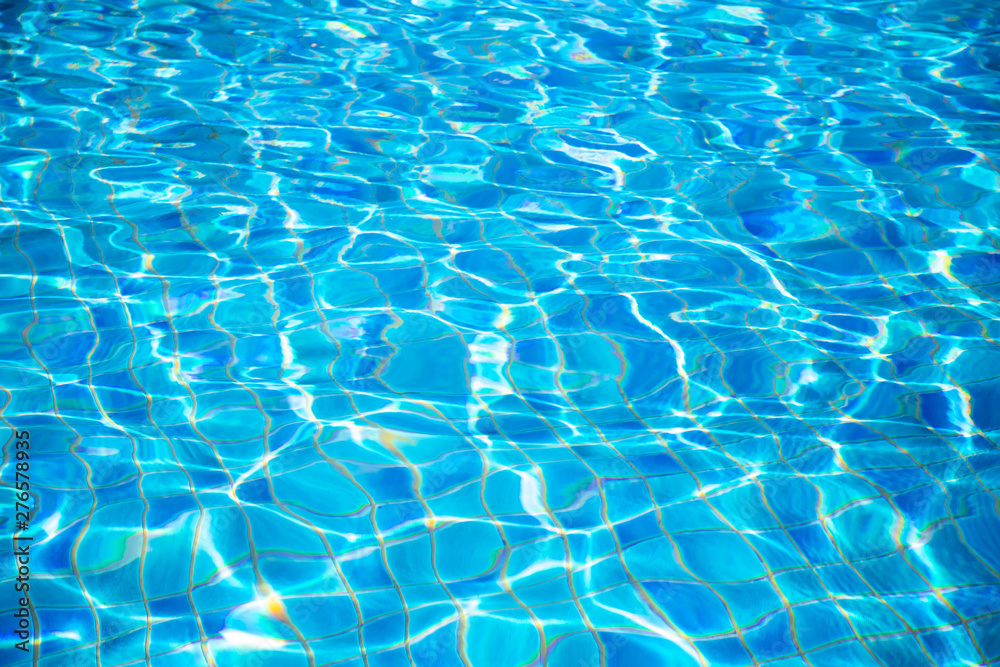 blue water ripple of swimming pool. water surface background. blue water ripple of swimming pool. water surface background.