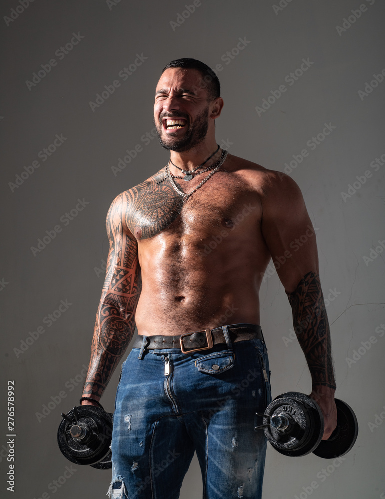 Macho confident face with muscular body sportsman bodybuilder. Muscular macho six packs hold dumbbells. Guy attractive working out. Muscular torso. Work out concept. There is no limit to perfection