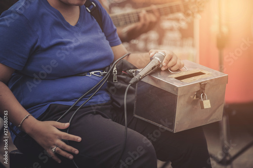 Young women begged to sing for money to use in their lives.