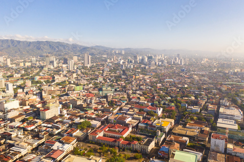 Cityscape in the morning. The streets and houses of the city of Cebu, Philippines, top view. Panorama of the city with houses and business centers.