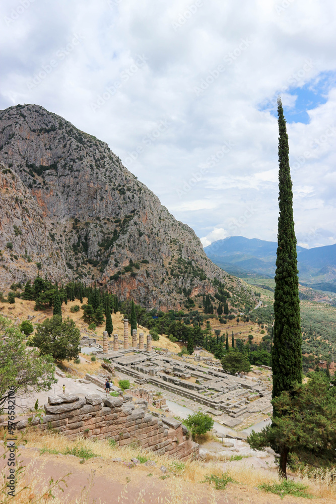 view from the top to ruins of ancient greek temple of apollo in Delphi, Greece
