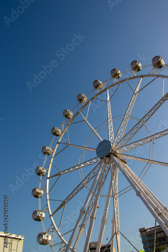 ferris wheel on blue sky