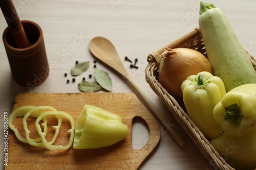 Vegetables in the kitchen, pepper, spices, zucchini, onions