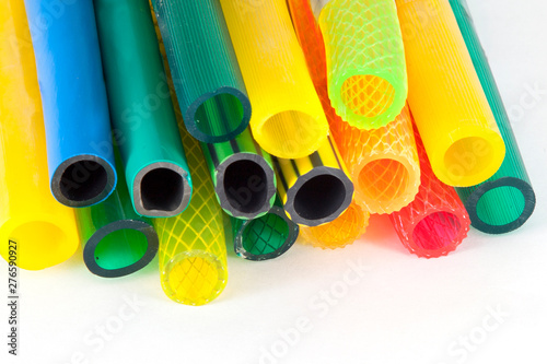 colorful gardening hoses on white background