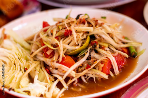The lunch of Thai food papaya salad,Som Tum,spicy flavor on the table.