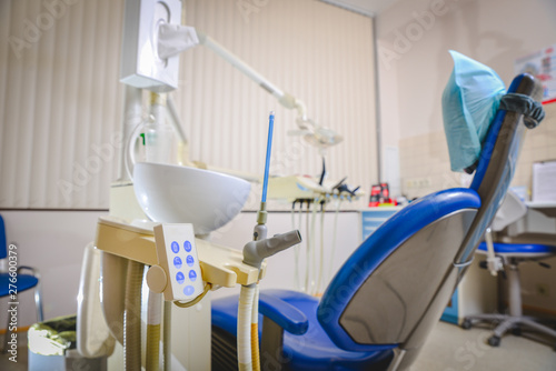 Dental clinic  room with dental chair and medical equipment