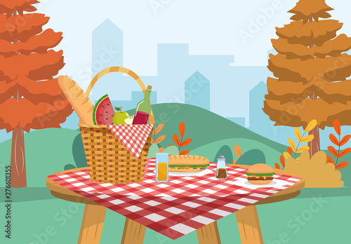 hamper with bread and wine bottle with hamburger