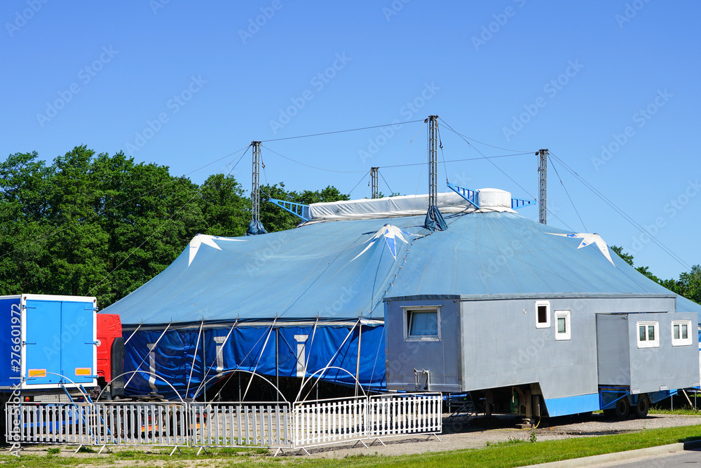 traveling circus blue tent against a blue sky traveling circus blue tent against a blue sky
