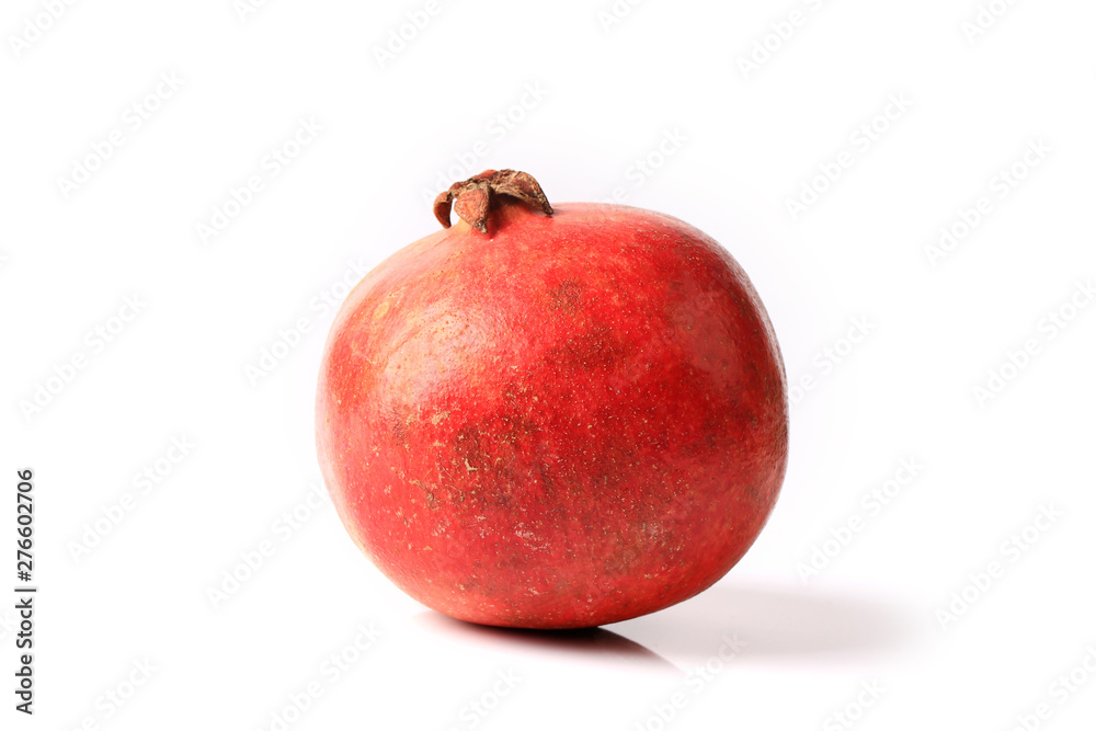 whole pomegranate isolated on white background whole pomegranate isolated on white background