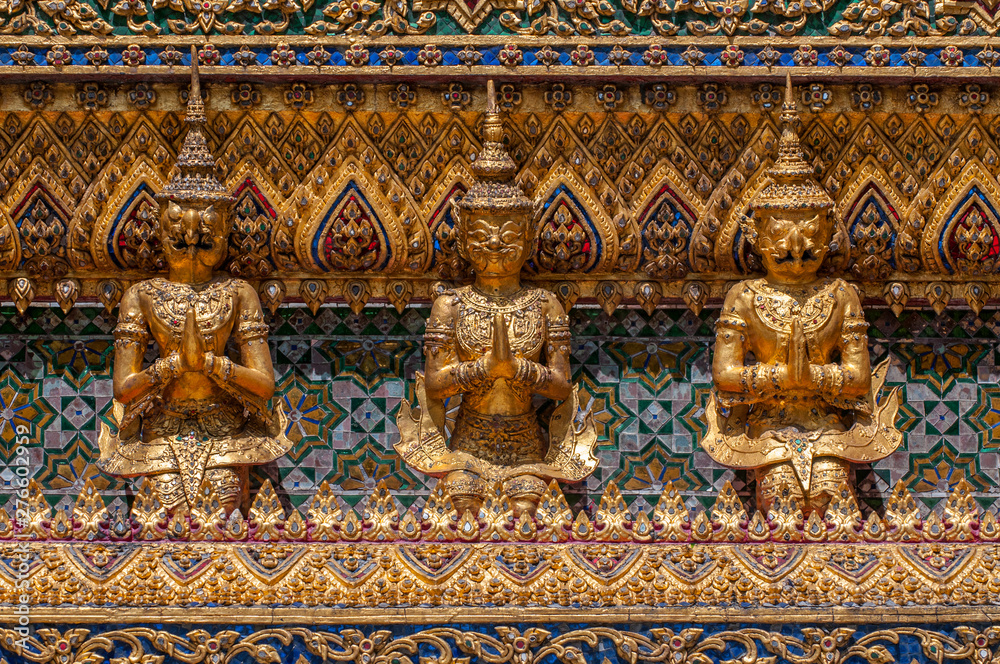 Mosaic encrusted wall of the Phra Mondop library building on the grounds of the Grand Palace Bangkok Thailand.